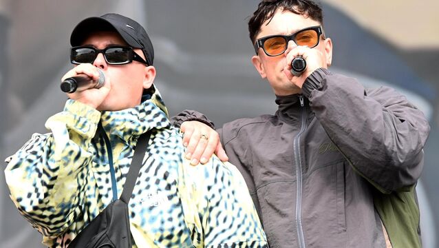 <p>Kneecap's Mo Chara and Móglaí Bap performing at Electric 2025. 'Whatever is behind its burgeoning cultural capital, it’s now cool to speak Irish in a way it simply wasn’t just five short years ago.' Picture: Larry Cummins</p>
