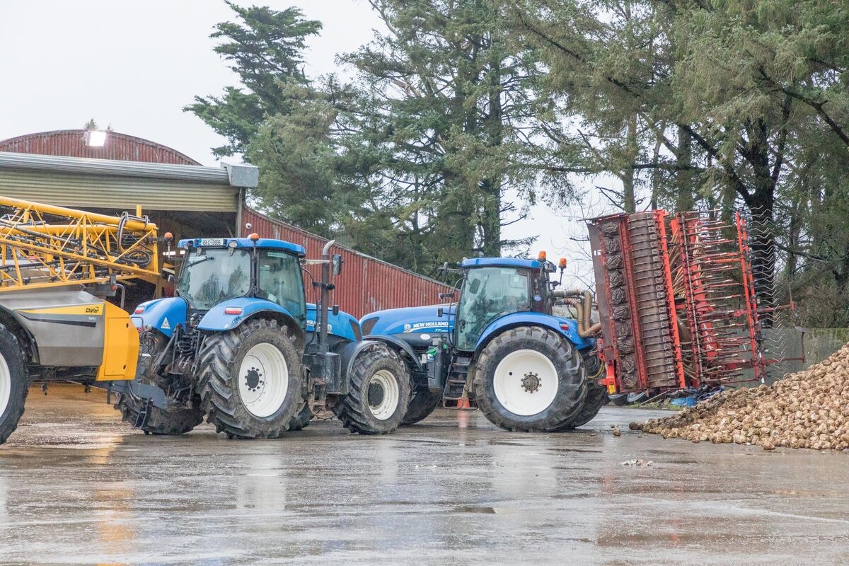 Machinery parked in the yard of Martin's farm.