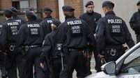 German police arrest two suspected with belonging to Islamist extremists