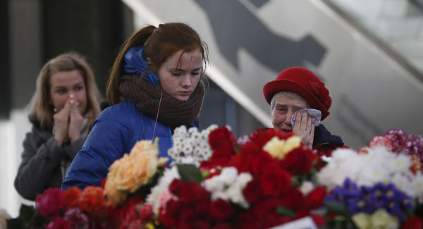 Mourners at Pulkovo airport during a day of national mourning for the victims of the plane crash. Pic: AP
