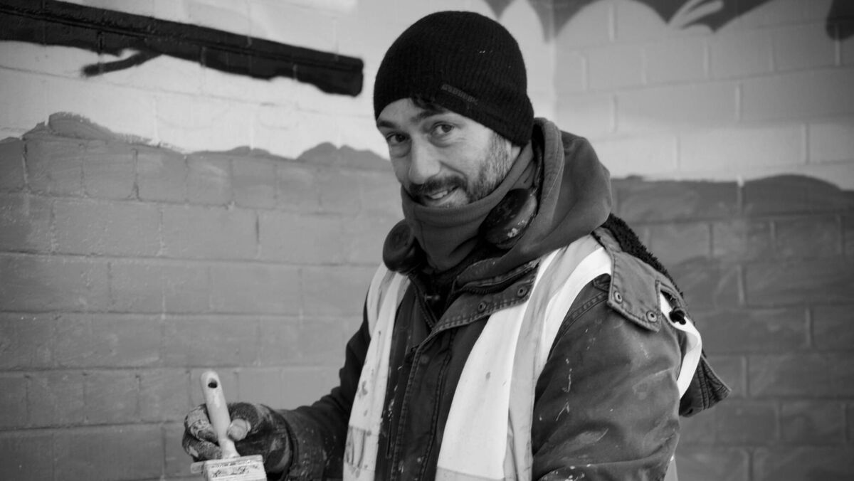 Italian street artist Raffaele Muraca at work on the pavilion on the Marina in Cork.