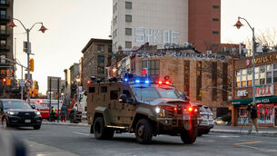 An armoured vehicle carrying Venezuelan president Nicolas Maduro and his wife Cilia Flores (Stefan Jeremiah/AP)
