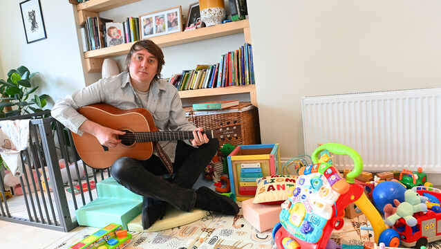 <p>Folk singer and songwriter, John Blek, among his new daughter's baby toys at home in Castletownroche, Co Cork. Picture: Larry Cummins</p>