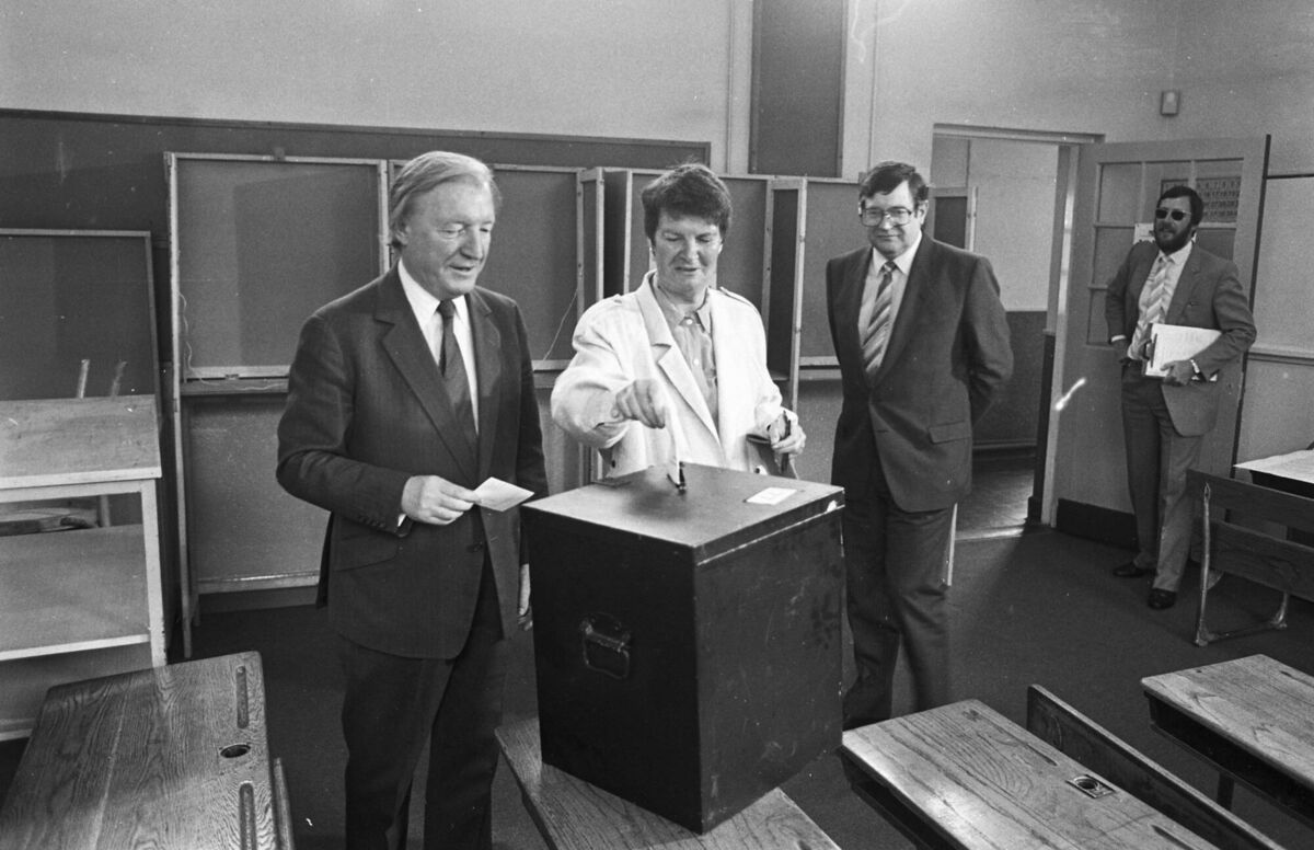 Fianna Fáil leader Charles Haughey and his wife Maureen casting their votes in the divorce referendum at Kinsealy NS on June 26, 1986. looking on is Ray Burke TD. Picture: Martin Nolan/INI/NLI/Getty 