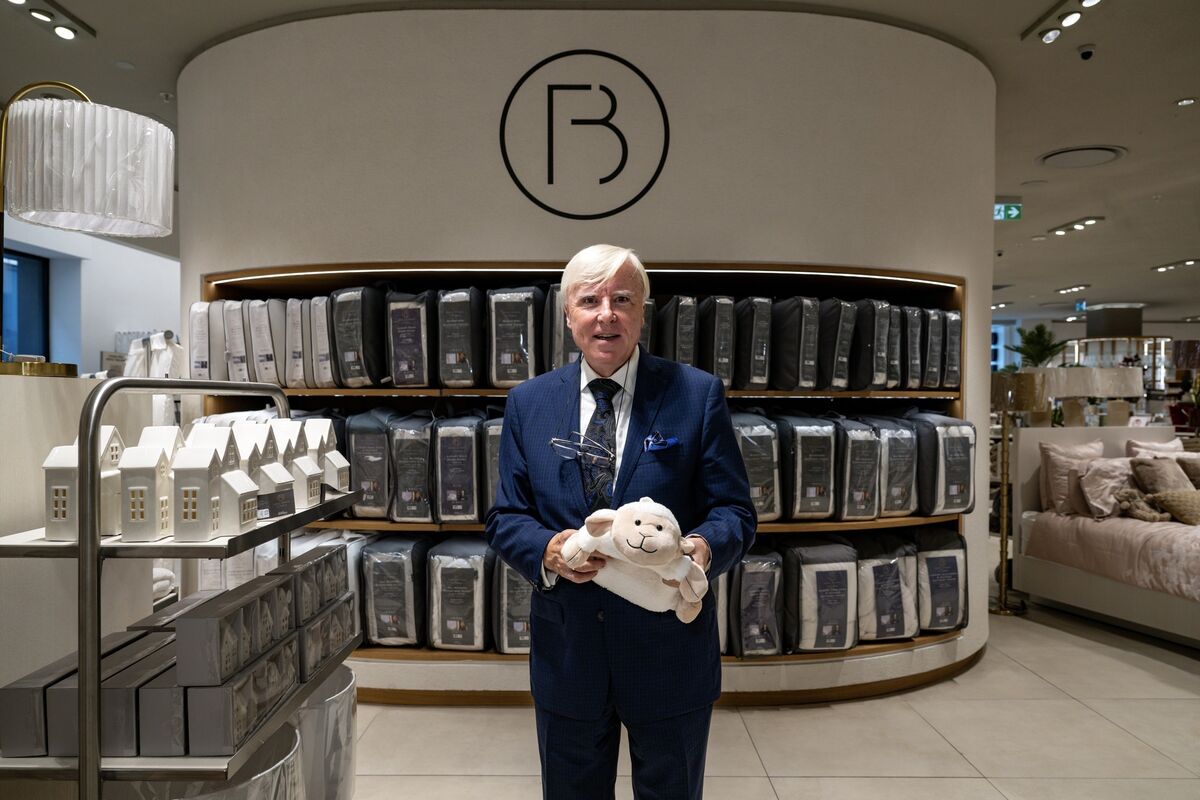 Francis Brennan at Dunnes Stores, Patrick Street, Cork, celebrating ten years of his Francis Brennan The Collection range, pictured with his popular sheep hot water bottle warmers. Picture Chani Anderson.