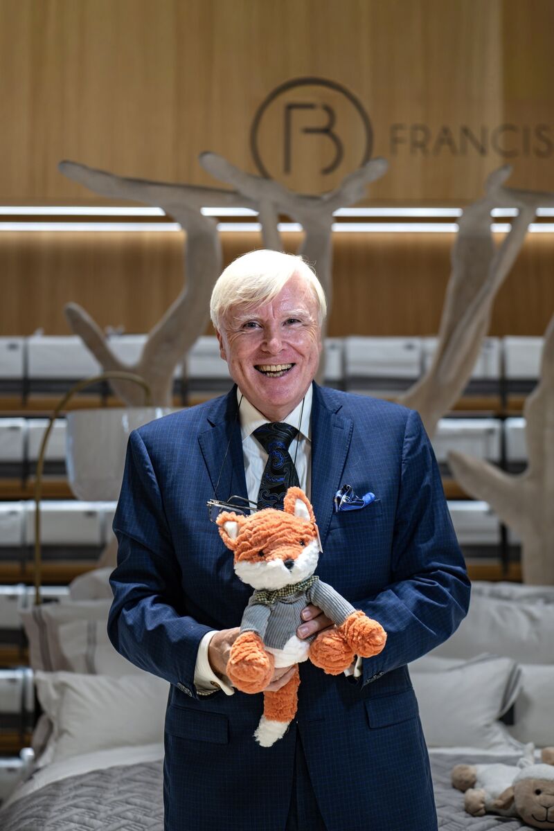 Francis Brennan at Dunnes Stores, Patrick Street, Cork, marking a decade of his Francis Brennan The Collection range, with Frank Fox, the beloved stuffed toy mascot, in front of a fully dressed bed display. Picture Chani Anderson.
