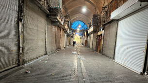 Shops are closed during protests in Tehran’s centuries-old main bazaar (Vahid Salemi/AP)