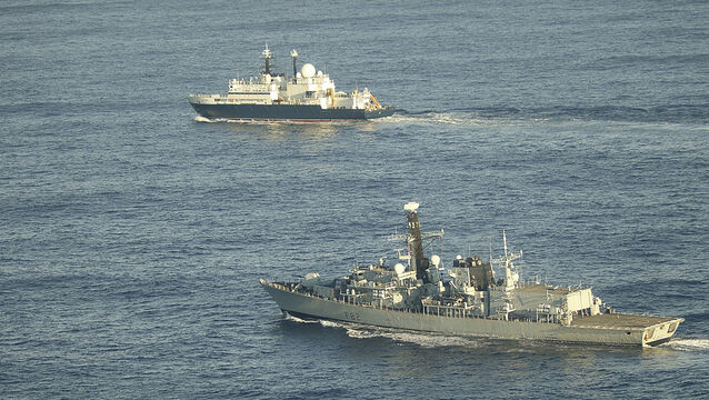 <p>The British Royal Navy's HMS Somerset flanking Russian ship Yantar near UK waters. For Ireland, being at the far end of Europe can no longer insulate the country from Russian interference. File photo</p>