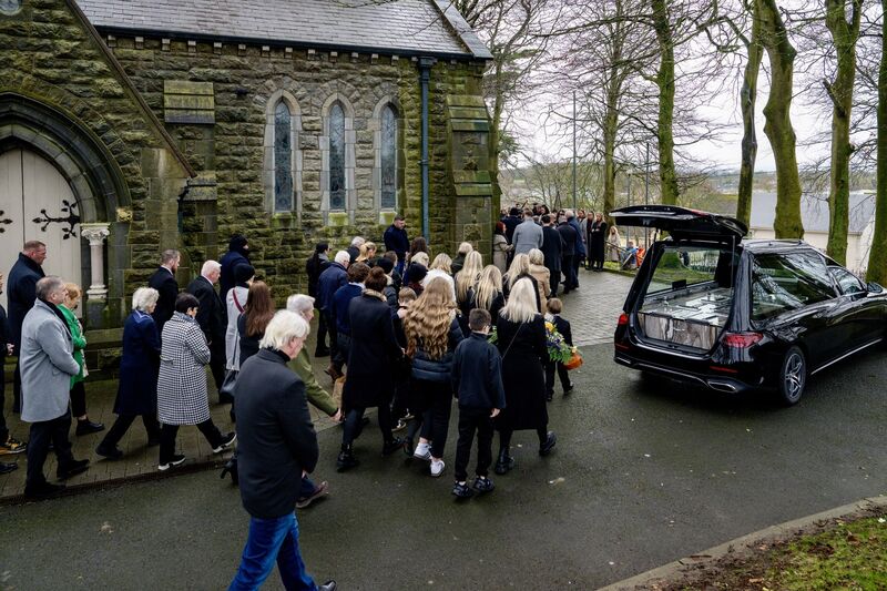 Family and friends follow the coffin of Pa O’Dwyer into St Mary’s Church, Rathkeale, Co Limerick, ahead of his requiem Mass on Wednesday morning. Picture: Chani Anderson