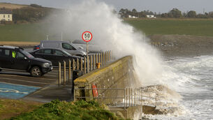 <p> Storm Herminia created huge waves that washed over the sea wall at Garretstown, Co Cork. File picture: Dan Linehan</p>