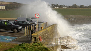 <p> Storm Herminia created huge waves that washed over the sea wall at Garretstown, Co Cork. File picture: Dan Linehan</p>
