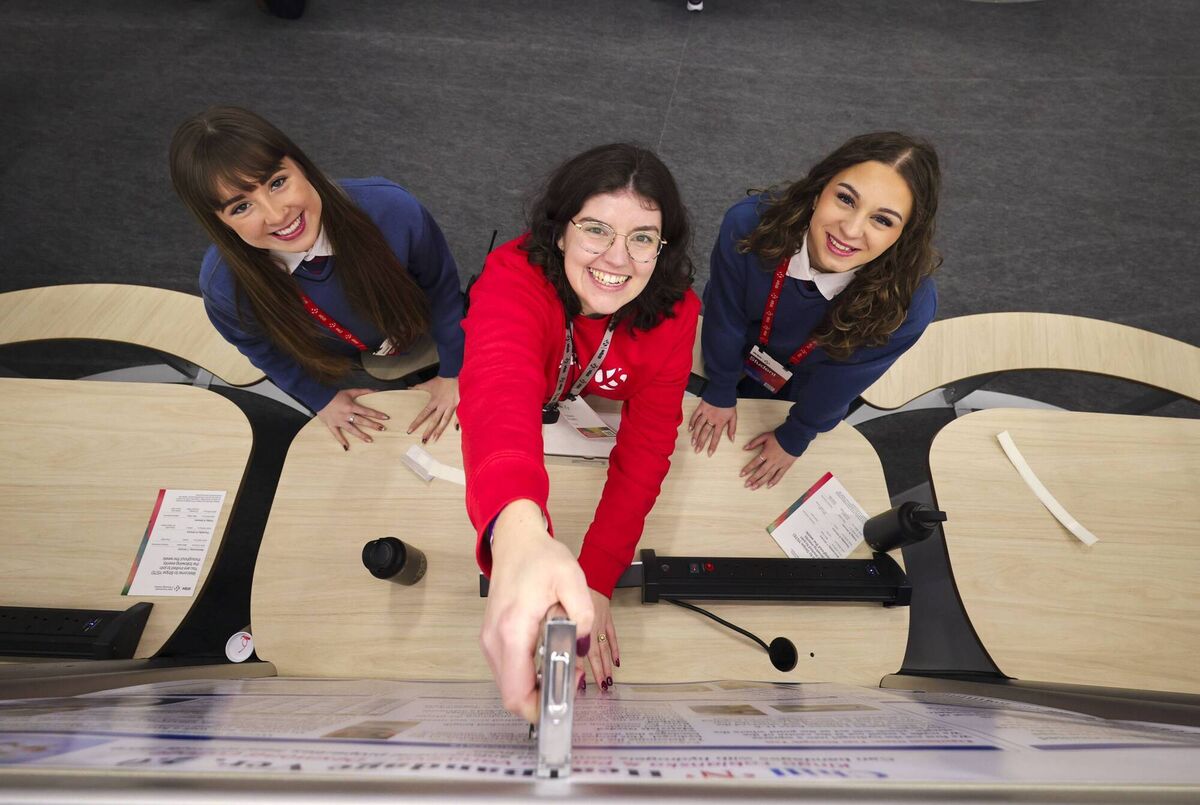 Kinga Tobianska and Paulina Varuyeva from Desmond College, Limerick, getting help from Alison Ahern, Stripe Redcoats at thhe 2026 Stripe Young Scientist and Technology Exhibition. Picture: Chris Bellew / Fennell Photography Kinga Tobianska and Paulina Varuyeva from Desmond College, Limerick, getting help from Alison Ahern, Stripe Redcoats at thhe 2026 Stripe Young Scientist and Technology Exhibition. Picture: Chris Bellew / Fennell Photography