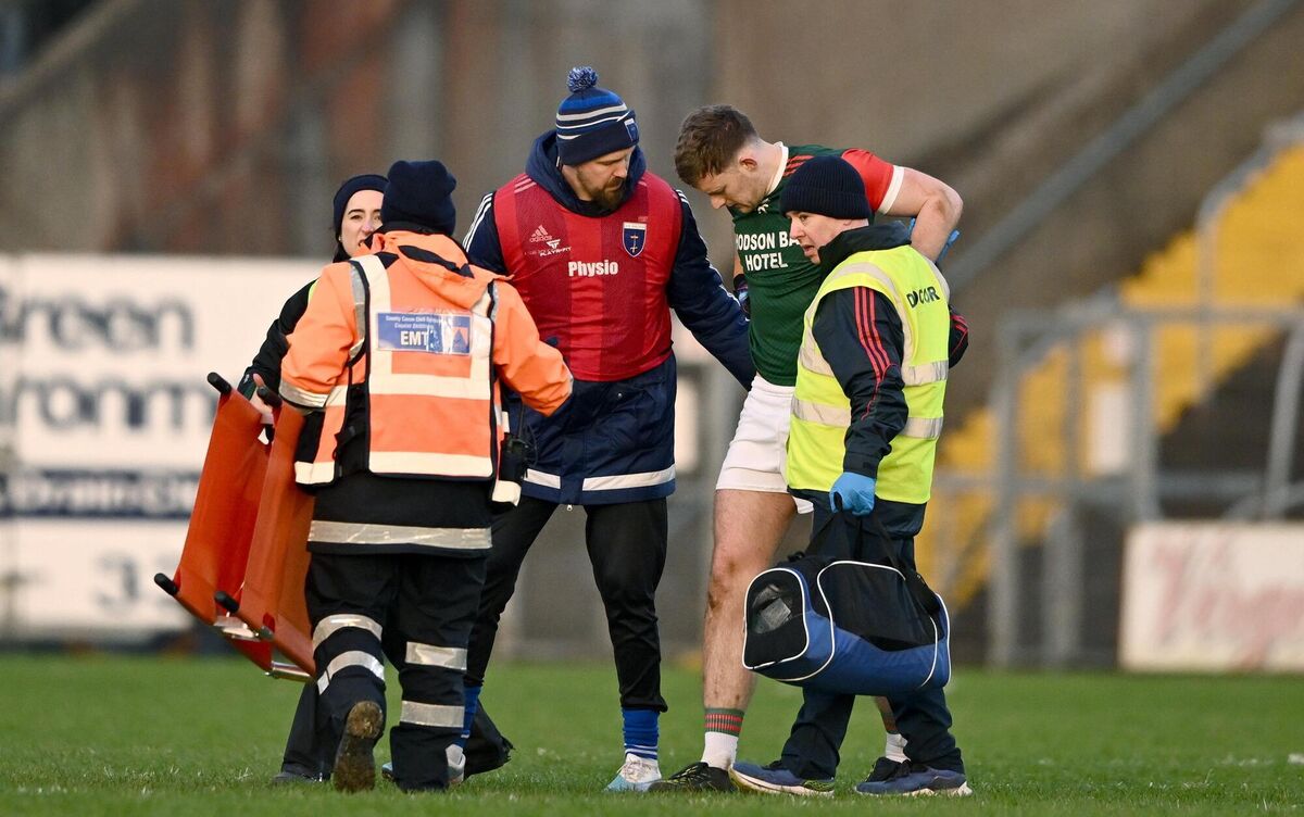Mark Daly of St Brigid's is assisted off the pitch by medical personnel after sustaining an injury during the All-Ireland semi-final against Scotstown. Pic: Ben McShane/Sportsfile