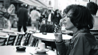 Lady with coffe and cigarette