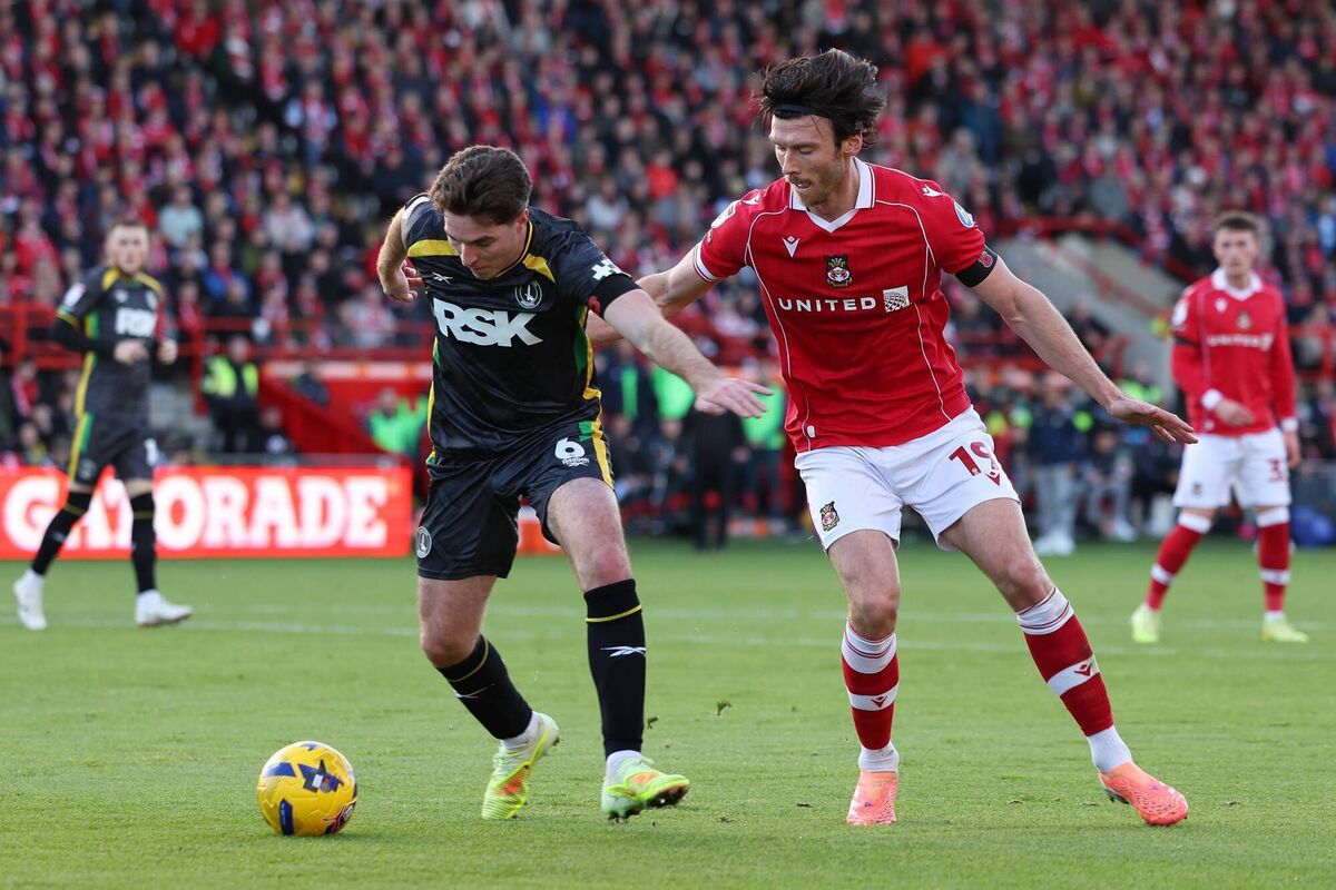 Conor Coventry of Charlton Athletic holds off against Kieffer Moore of Wrexham during the Sky Bet Championship match between Wrexham AFC and Charlton Athletic at Racecourse Ground on November 08, 2025 in Wrexham, Wales. (Photo by Annabel Lee-Ellis/Getty Images)