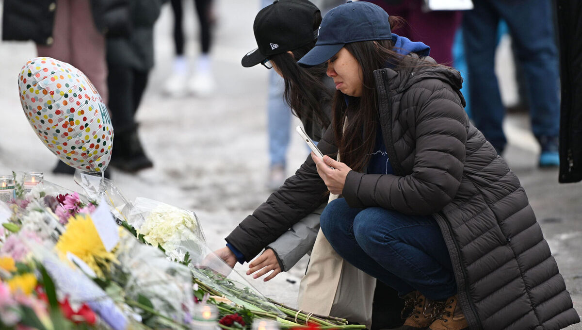 People gathered for a vigil yesterday in Minneapolis after Ms Good was fatally shot on Wednesday. Picture: Tom Baker/AP
                    