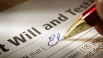 Man Signing Last Will & Testament