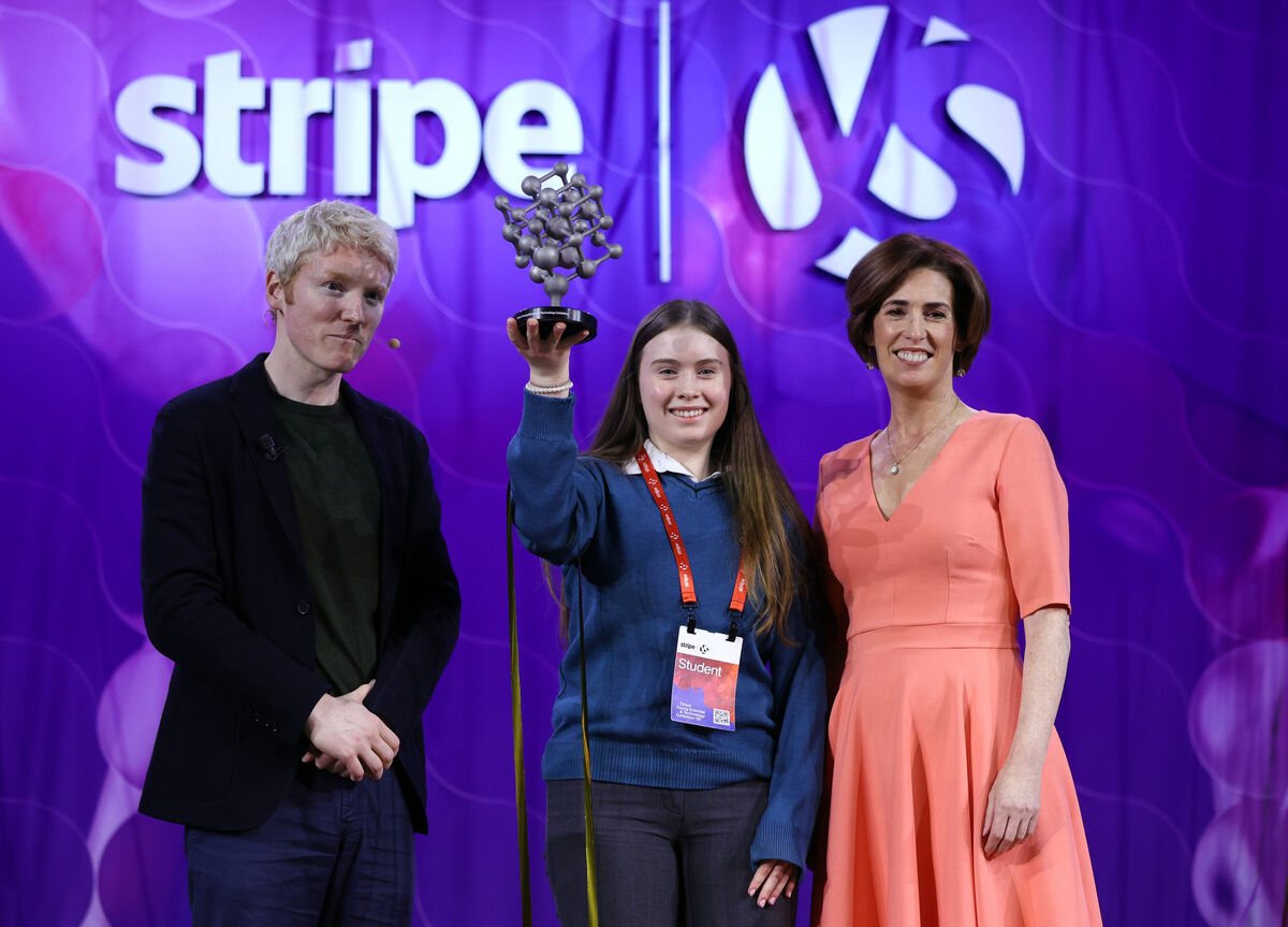 Stripe co-founder and former Young Scientist winner Patrick Collison and education minister Hildegarde Naughton congratulate overall winner Aoibheann Daly from Mercy Mounthawk Secondary School in Tralee at the Stripe Young Scientist Exhibition in the RDS. Picture: Leah Farrell/RollingNews Stripe co-founder and former Young Scientist winner Patrick Collison and education minister Hildegarde Naughton congratulate overall winner Aoibheann Daly from Mercy Mounthawk Secondary School in Tralee at the Stripe Young Scientist Exhibition in the RDS. Picture: Leah Farrell/RollingNews
