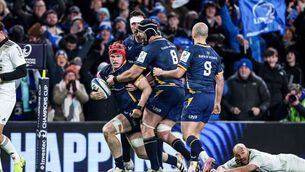 <p>Leinster’s Josh van der Flier celebrates after scoring his teams third try with Jack Conan and Caelan Doris. Pic ©INPHO/Nick Elliott</p>