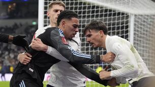 <p>Aston Villa's Morgan Rogers (left) and Tottenham Hotspur's Joao Palhinha (right) clash after the Emirates FA Cup third round match. Photo: Andrew Matthews/PA Wire. </p>