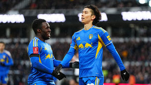 Leeds’ Ao Tanaka, right, celebrates with Wilfried Gnonto after scoring their side’s second goal at Derby (PA) Leeds’ Ao Tanaka, right, celebrates with Wilfried Gnonto after scoring their side’s second goal at Derby (PA)
