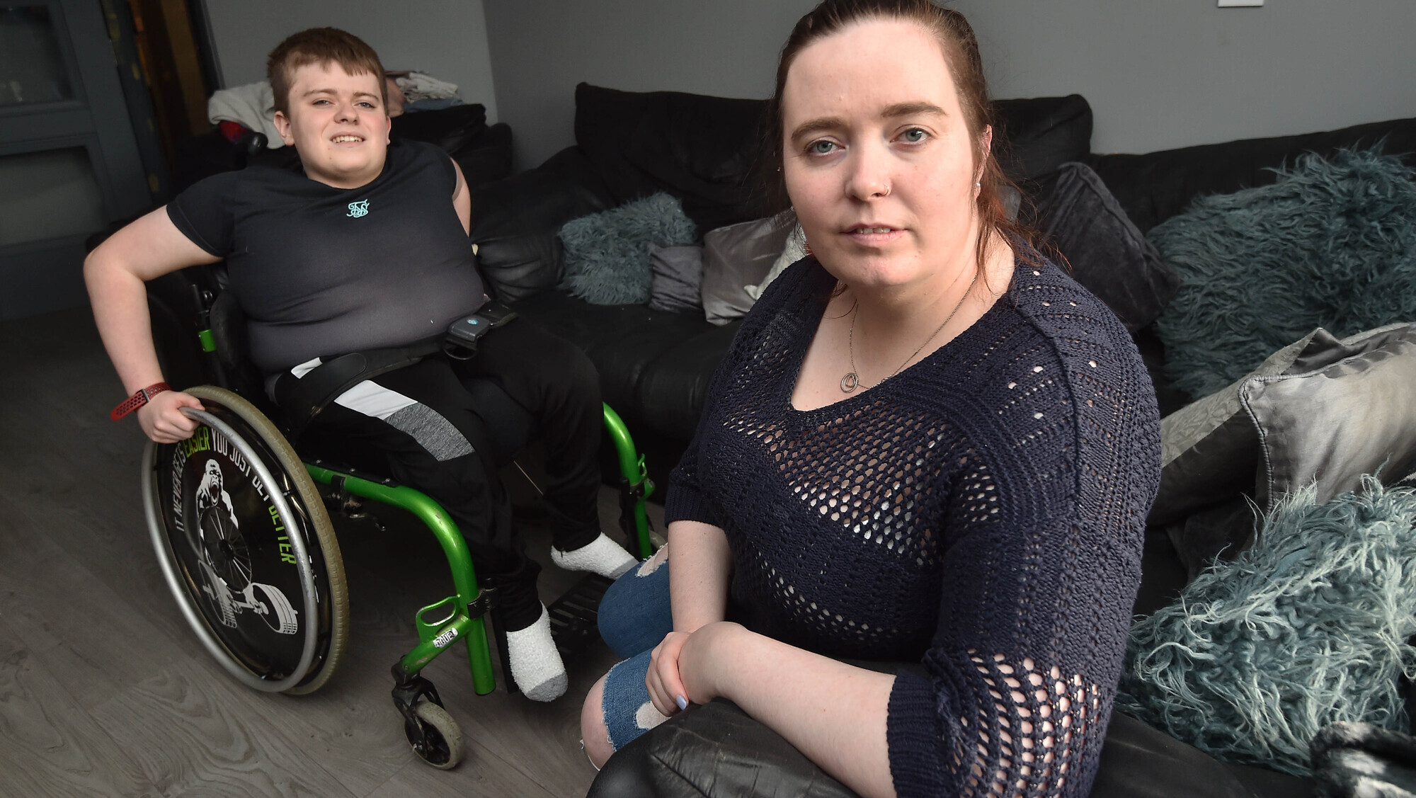  A 2021 file photo of Amanda Coughlan Santry with her son TJ who suffers from spina bifida at home in Tullamore, Co Offaly. The support group she co-founded had a 'very positive, very constructive' meeting in recent days. Picture: Ray Ryan