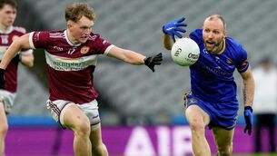 <p>BATTLE: Eoin Mellon of Clogher Éire Óg and Aidan Breen of Ballymacelligott in action. Pic: ©INPHO/James Lawlor.</p>