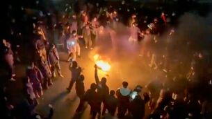 <p>In this frame grab from footage circulating on social media shows protesters dancing and cheering around a bonfire as they take to the streets despite an intensifying crackdown as the Islamic Republic remains cut off from the rest of the world, in Tehran, Iran, Friday, Jan. 9, 2026. Picture: UGC via AP</p> <p>In this frame grab from footage circulating on social media shows protesters dancing and cheering around a bonfire as they take to the streets despite an intensifying crackdown as the Islamic Republic remains cut off from the rest of the world, in Tehran, Iran, Friday, Jan. 9, 2026. Picture: UGC via AP</p>