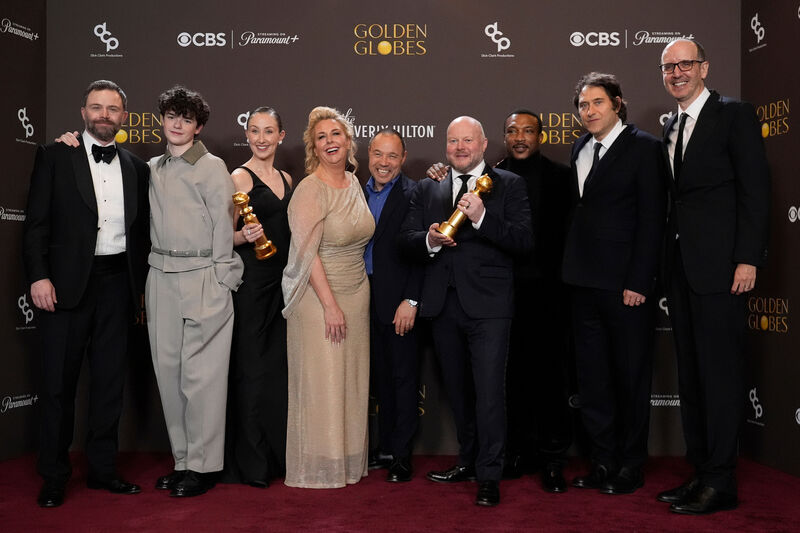 Philip Barantini, from left, Owen Cooper, Erin Doherty, Hannah Walters, Stephen Graham, Andy Cooper, Ashley Walters, Jeremy Kleiner, and Jack Thorne pose in the press room with the award for best television limited series, anthology series or motion picture made for television for "Adolescence" during the 83rd Golden Globes on Sunday. Picture: AP Photo/Chris Pizzello.