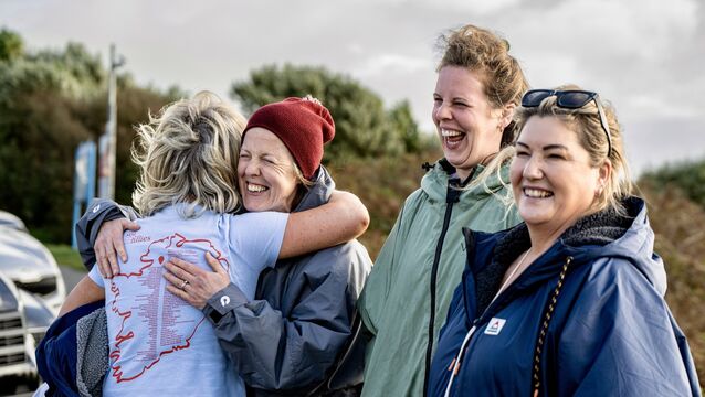 <p>Smiles and hugs on the shore as friends reunite to celebrate the Sea Fillies’ achievement at Inchydoney Beach. Picture Chani Anderson.</p>