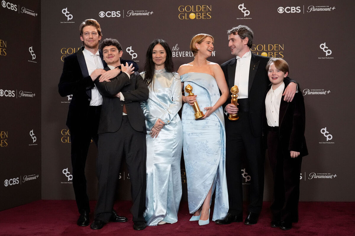 Joe Alwyn, from left, Noah Jupe, Chloe Zhao, Jessie Buckley, Paul Mescal, and Jacobi Jupe in the press room with the award for best motion picture - drama for 'Hamnet' at the 83rd Golden Globes on Sunday. Photo: AP/Chris Pizzello