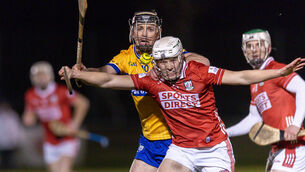 <p>Cork’s Colm McCarthy with Cathal Malone of Clare during the Munster SHL clash in Mallow. Pic: ©INPHO/Natasha Barton</p>