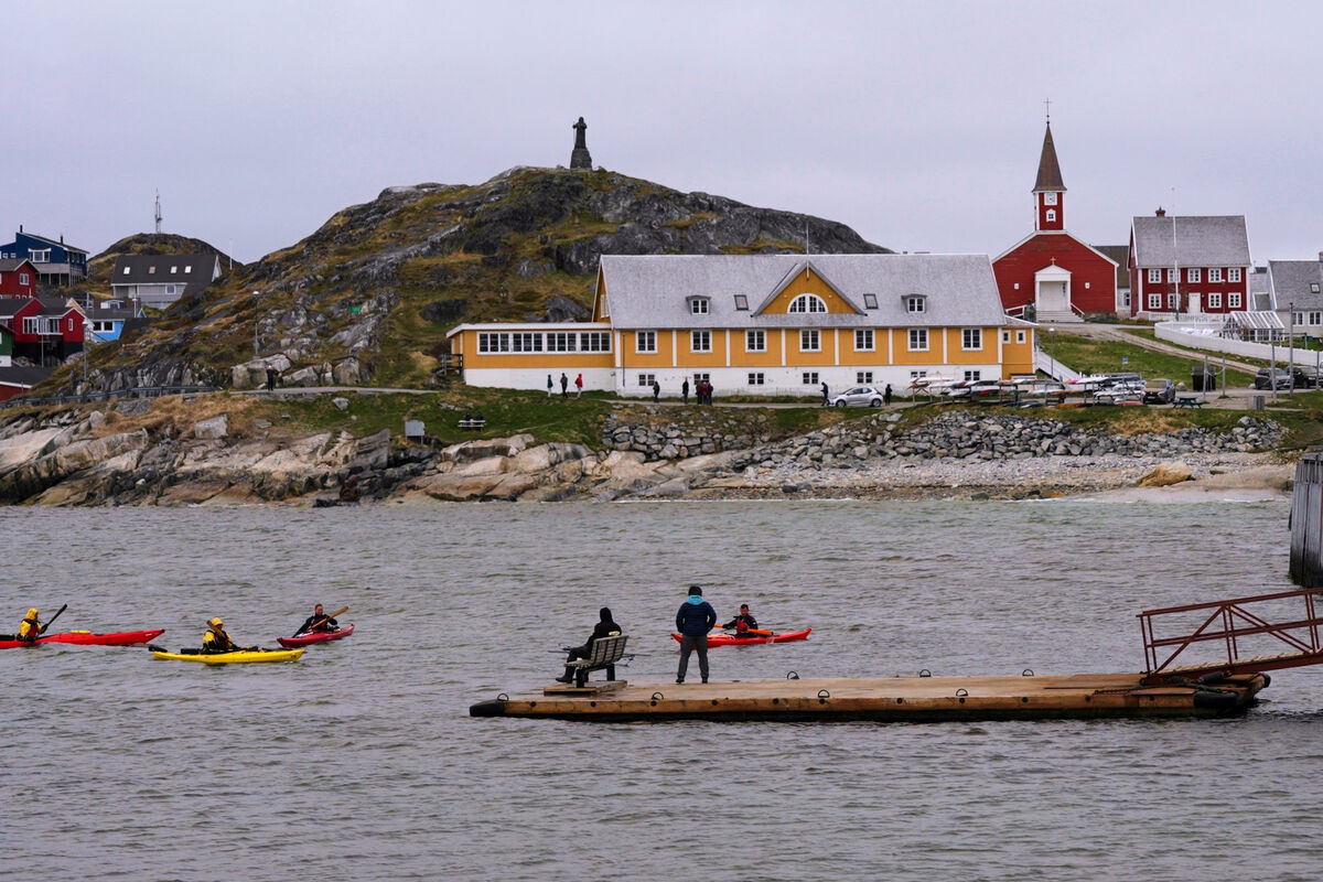 Tourists kayak in front of Nuuk Cathedral in Nuuk, Greenland, last summer. The UK is one of a group of European countries advocating a European-led Nato mission to Greenland. File photo: AP/Kwiyeon Ha