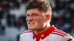 <p>Munster's Jack O'Donoghue dejected after the match. Pic: INPHO/Billy Stickland</p>