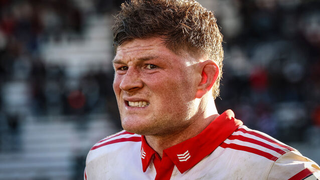 <p>Munster's Jack O'Donoghue dejected after the match. Pic: INPHO/Billy Stickland</p>