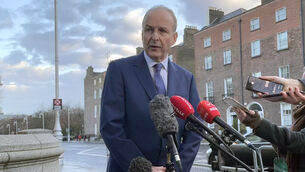 <p>Taoiseach Micheal Martin speaking to members of the media outside Government Buildings in Dublin about migration, infrastructure and the US (Grainne Ni Aodha/PA)</p>