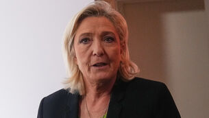 <p>Far-right leader Marine Le Pen arrives at National Rally president Jordan Bardella’s New Year address to the press in Paris, France (Christophe Ena/AP)</p>