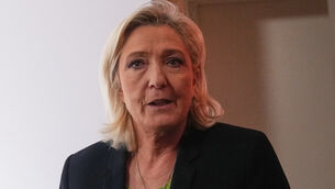 <p>Far-right leader Marine Le Pen arrives at National Rally president Jordan Bardella’s New Year address to the press in Paris, France (Christophe Ena/AP)</p>