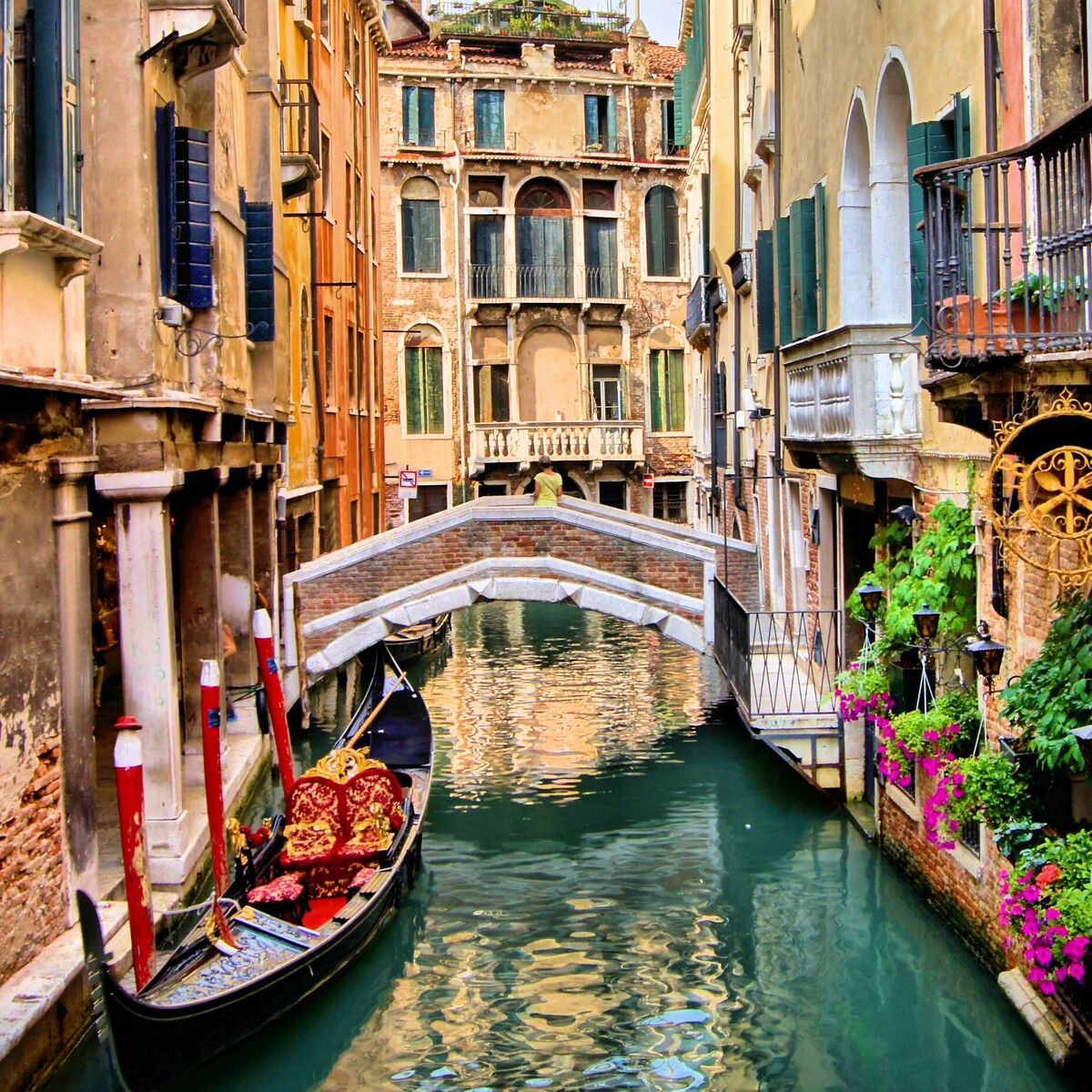 Canals crisscross Venice in a shimmering tangle