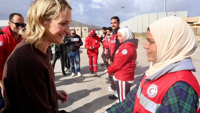 <p>Ireland's foreign minister Helen McEntee meeting Egyptian Red Crescent workers near the Rafah border. Ms McEntee heard how Israel has banned a long list of items including wheelchairs.  </p>