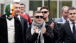 <p>Kneecapâs Liam Og O hAnnaidh (centre, in keffiyeh), who performs under the stage name Mo Chara, outside Woolwich Crown Court in September Picture: Aaron Chown/PA</p> <p>Kneecapâs Liam Og O hAnnaidh (centre, in keffiyeh), who performs under the stage name Mo Chara, outside Woolwich Crown Court in September Picture: Aaron Chown/PA</p>