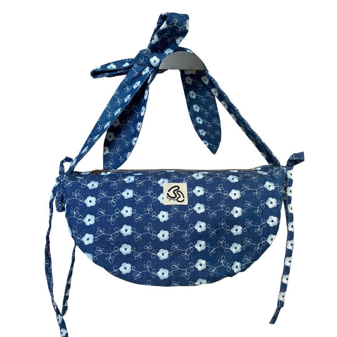 Denim Embroidered Ruched Pouch, €110, Bogha Bags.