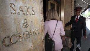 <p>A Saks & Company doorman opens the 50th Street store entrance for a customer. Saks Global Enterprises has filed for bankruptcy to address mounting losses and a substantial debt load that has weighed down the iconic luxury retailer. Picture: AP Photo/Richard Drew</p> <p>A Saks & Company doorman opens the 50th Street store entrance for a customer. Saks Global Enterprises has filed for bankruptcy to address mounting losses and a substantial debt load that has weighed down the iconic luxury retailer. Picture: AP Photo/Richard Drew</p>