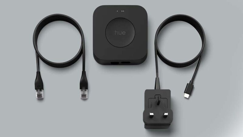 Inside the box, you get the Bridge Pro, USB-C power adapter and an Ethernet cable. Picture: Signify. Inside the box, you get the Bridge Pro, USB-C power adapter and an Ethernet cable. Picture: Signify.
