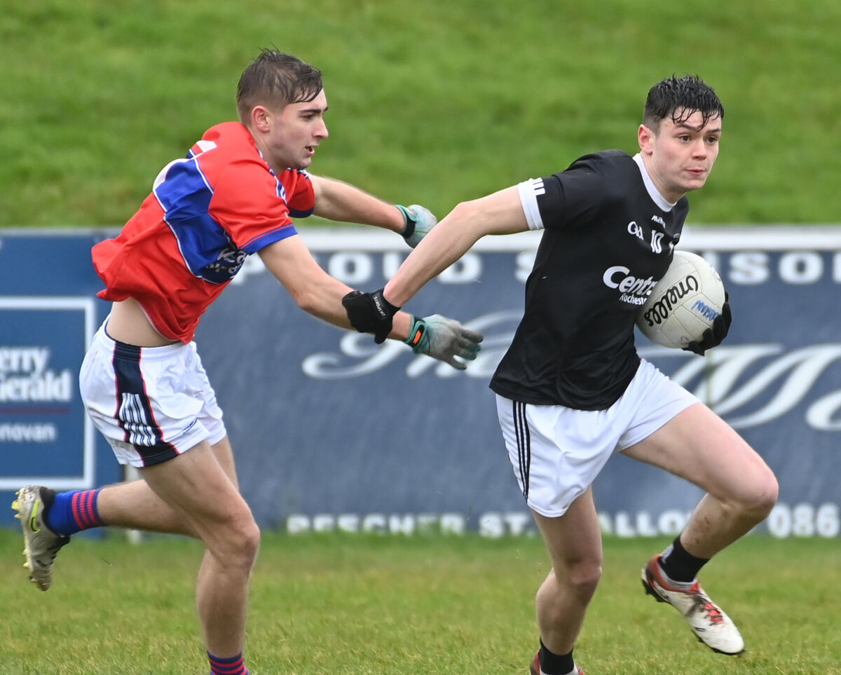 St. Francis College, Rochestown's Ronan Sweeney goes past IS Killorglin's Dylan Flynn. Pic: Eddie O'Hare