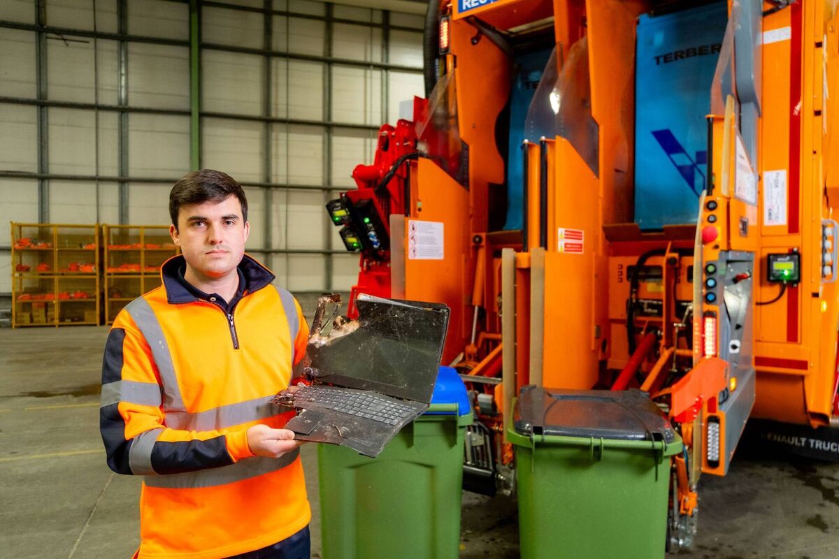 Waste operator Alan Hassett with an electronic item that poses a fire risk if placed in a bin or skip. Picture: Paul Corey