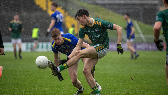 <p>Eoin O'Flaherty of Tralee CBS and Cian Mulcahy of St Brendan's, Killarney. Pic: Domnick Walsh © Eye Focus LTD.</p>