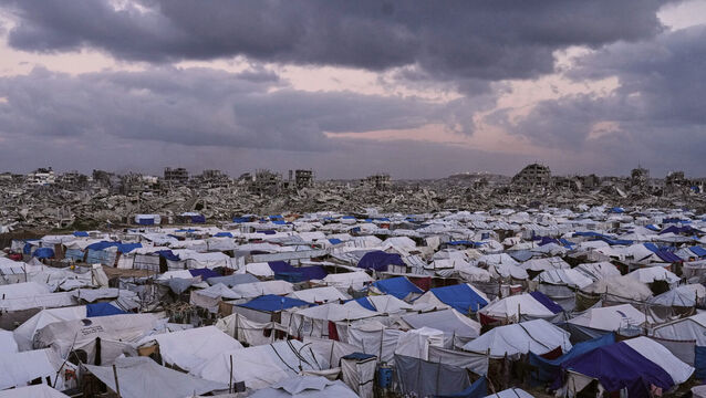 A tent camp for displaced Palestinians stretches across the Zeitoun neighbourhood of Gaza City (Jehad Alshrafi/AP)