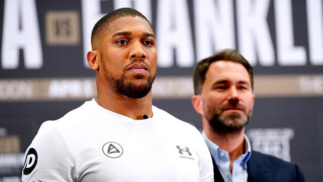 <p>Anthony Joshua’s promoter Eddie Hearn (right) believes he will return to boxing at some point (Zac Goodwin/PA)</p>