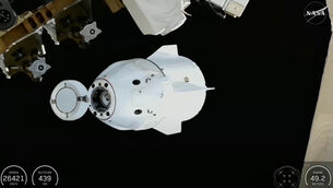 <p>The SpaceX Dragon departing from the International Space Station shortly after undocking with four crew-members inside (Nasa via AP)</p>